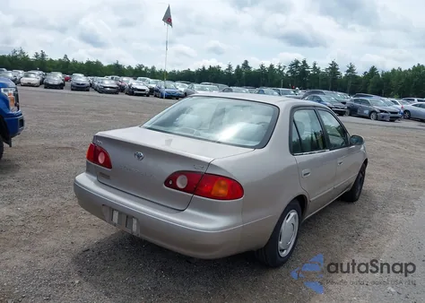 2001 Toyota Corolla Le from USA, damaged, VIN 2T1BR12E01C399979